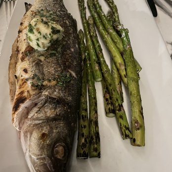 Bodega Ole - Whole sea bass with a side of asparagus - Spanish Near Me - Naples, Florida Bodega Ole - Whole sea bass with a side of asparagus - Spanish Near Me - Naples, Florida