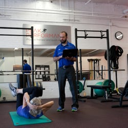 Peak Performance Physical Therapy and Sports Medicine - Mike working with a patient.