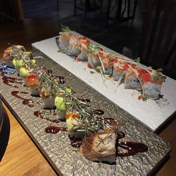 Koi - Skywalker (left), Aburi Salmon (right) - Sushi Bars Near Me - Houston, Texas Koi - Skywalker (left), Aburi Salmon (right) - Sushi Bars Near Me - Houston, Texas