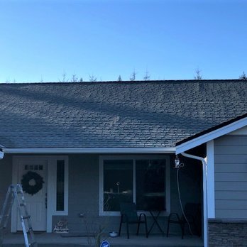 Coval Homes - Photo showing lifting of the sheeting that Coval Homes says is normal, do not hire this company, they will not guarantee their work. - General Contractors Near Me - Tacoma, Washington