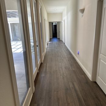 Lola Loves Cleaning - Walk along this long hallways barefoot and come out with clean feet. - Home Cleaning Near Me