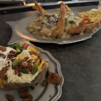 Mike Anderson's - Gonzales - Shrimp Norman with Loaded Baked Potato - Seafood Near Me - Gonzales, Louisiana