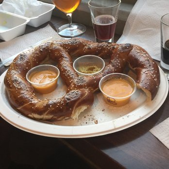 Delish Dogs - This giant pretzel goes great with any beer. Plenty to share. - Caterers Near Me Delish Dogs - This giant pretzel goes great with any beer. Plenty to share. - Caterers Near Me