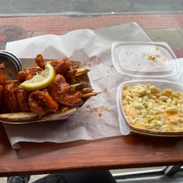 Buffalo shrimp and fries and Aged Reserve Cheddar Mac and Cheese Buffalo shrimp and fries and Aged Reserve Cheddar Mac and Cheese