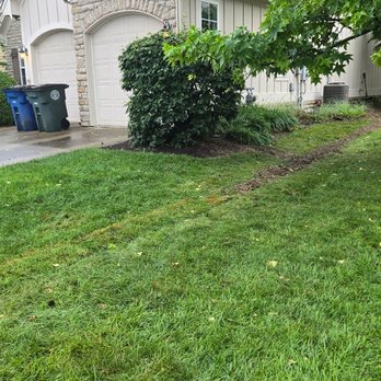 CleanFlow of Ohio - A finished French drain blends right into the yard, keeping your property dry without changing the look of your lawn. - Gutter Services Near Me - Kettering, Ohio CleanFlow of Ohio - A finished French drain blends right into the yard, keeping your property dry without changing the look of your lawn. - Gutter Services Near Me - Kettering, Ohio