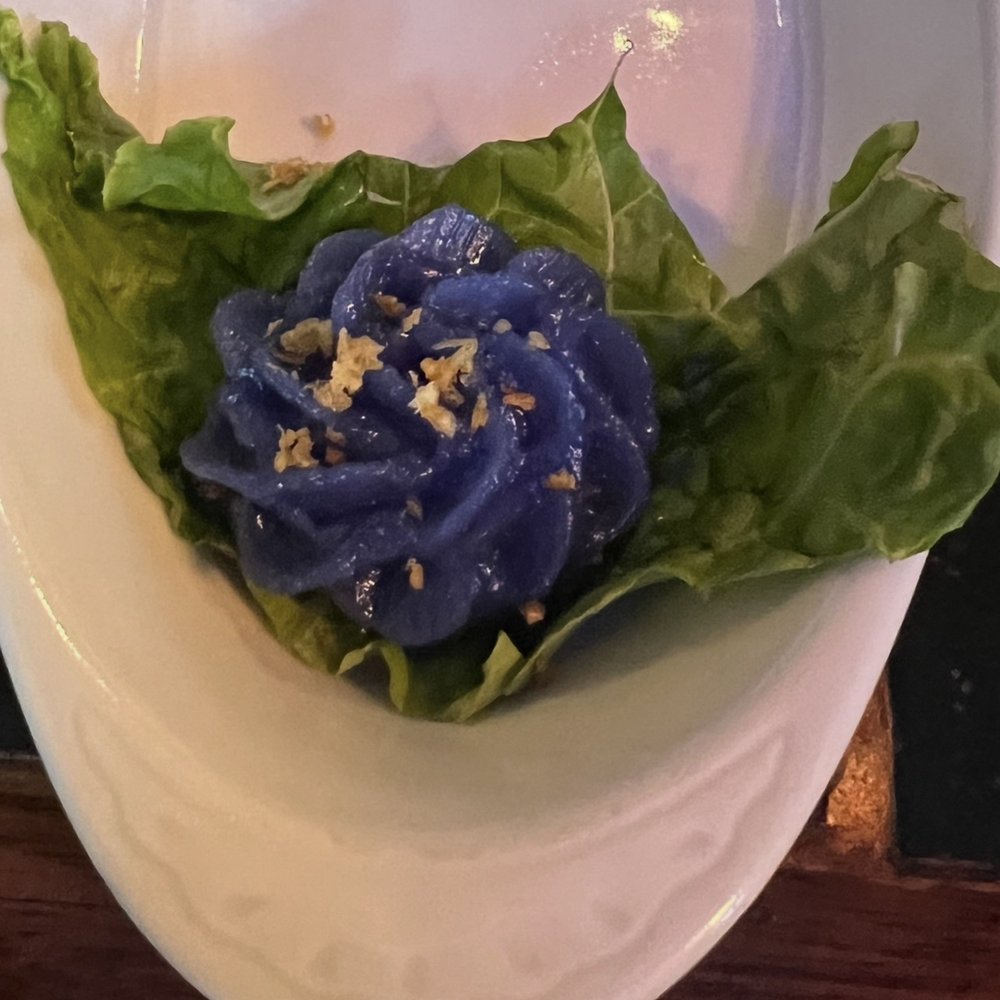 Violet-hued Chor Muang stuffed with pork and peanuts Violet-hued Chor Muang stuffed with pork and peanuts