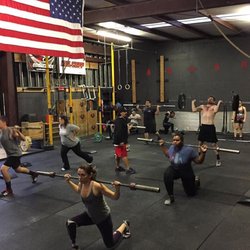 California Precision Strength & Conditioning - Groups style class with coaches on hand with tip to improve technique and safety.