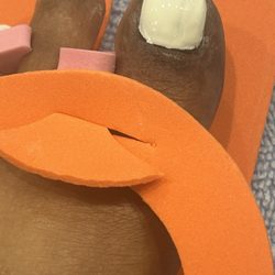 Elegant Nails - This was a horrible polish job that look like my daughter did them