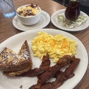 Hope’s Brunch House - French toast combo with crispy bacon and smoked grits with cheese and bacon. Looks amazing!!!!! - Coffee & Tea Near Me - Phoenix, Arizona