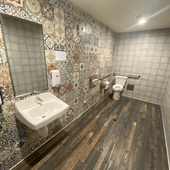 Taco Bell - a bathroom with a toilet and a sink - Fast Food Near Me - Big Bear Lake, California