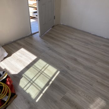 DK Laminate Installation - Floating floor in a small shed - Flooring Near Me