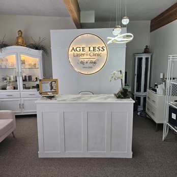 Age Less Laser + Clinic - Picture of front desk with lit up sign behind - Skin Care Near Me - Victoria, British Columbia Age Less Laser + Clinic - Picture of front desk with lit up sign behind - Skin Care Near Me - Victoria, British Columbia