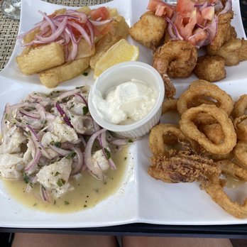 Tumi Peruvian and Italian Kitchen - Original ceviche with fried seafood, fish and yuca - Italian Near Me - Hyannis, Massachusetts Tumi Peruvian and Italian Kitchen - Original ceviche with fried seafood, fish and yuca - Italian Near Me - Hyannis, Massachusetts