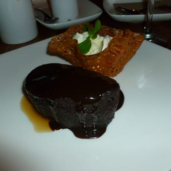 Earls Kitchen + Bar - Chocolate Sticky Toffee Pudding - warm rich chocolate cake, chocolate and toffee sauces, Mario's Gelati vanilla bean gelato - Canadian (New) Near Me - Toronto, Ontario Earls Kitchen + Bar - Chocolate Sticky Toffee Pudding - warm rich chocolate cake, chocolate and toffee sauces, Mario's Gelati vanilla bean gelato - Canadian (New) Near Me - Toronto, Ontario
