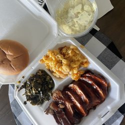 Buttman BBQ - The chicken dinner with Mac and cheese, Greens, Potato Salad.