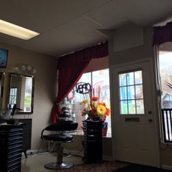 D'Bautista Beauty And Barber Shop - Very clean and they open most days at 9am