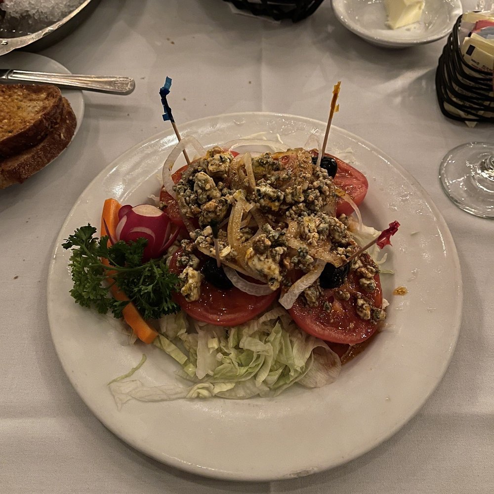 Dal Rae Restaurant - Vine Ripened tomatoes & Maui onions with blue cheese top - Steakhouses Near Me - Pico Rivera, California Dal Rae Restaurant - Vine Ripened tomatoes & Maui onions with blue cheese top - Steakhouses Near Me - Pico Rivera, California