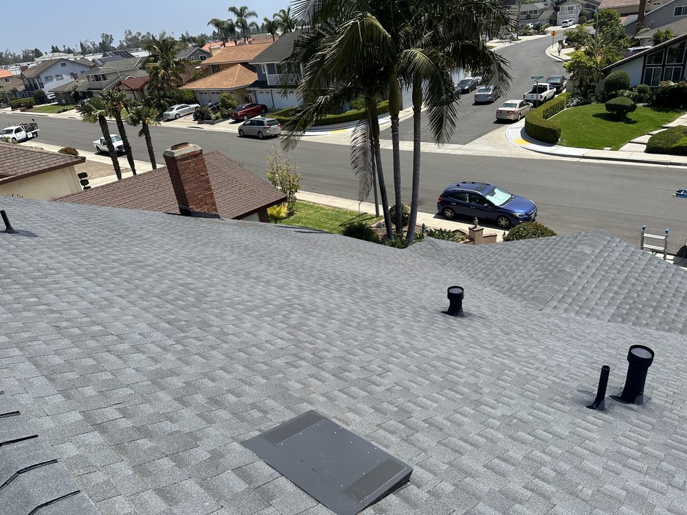 Slide of Rod's Roofing