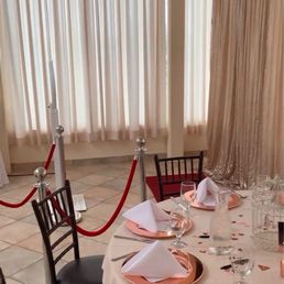 Champagne sequin backdrop, red carpet, velvet ropes and digital photo booth.