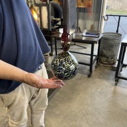 Fire Studio & Gallery - The creation of a glass bowl being shaped