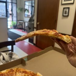 Domenick & Pia Pizzeria - Side view of Cheese Pizza Slice