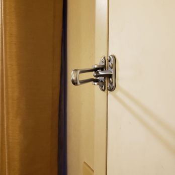 Super 8 by Wyndham Big Spring TX - Door bolt not attached to the molding.   Secure?  I don't think so. - Hotels Near Me - Big Spring, Texas