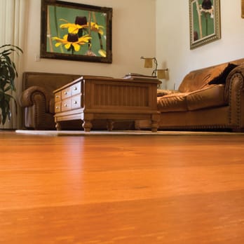 N-Hance - a living room with a couch and a coffee table - Refinishing Services Near Me