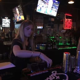 Pretty bartender making drinks. Pretty bartender making drinks.