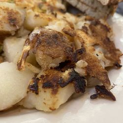 Daily Planet Diner - Home Fries $0  Included with omelette