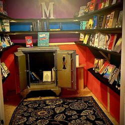 The Midnight Oil - The restricted book section. A selection of books that have been banned from public settings.
