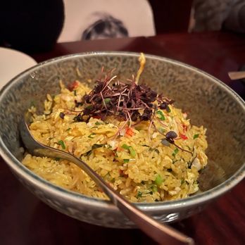 Buddakan - a bowl of rice with a spoon in it - Asian Fusion Near Me - Philadelphia, Pennsylvania Buddakan - a bowl of rice with a spoon in it - Asian Fusion Near Me - Philadelphia, Pennsylvania