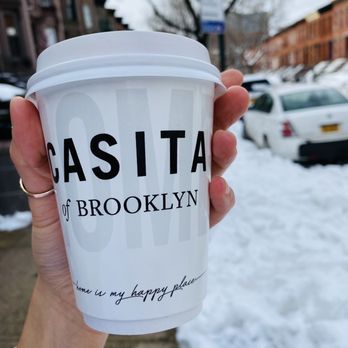 Casita - a person holding a cup of coffee - Coffee & Tea Near Me - Brooklyn, New York