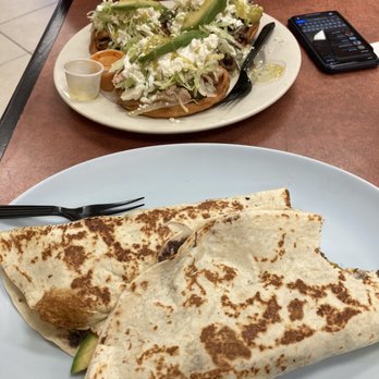 Taqueria Los Compadres - Baleadas in the foreground and Sopes in the background. - Tacos Near Me - Waldorf, Maryland Taqueria Los Compadres - Baleadas in the foreground and Sopes in the background. - Tacos Near Me - Waldorf, Maryland