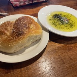 Dinner rolls/ olive oil dipping sauce.