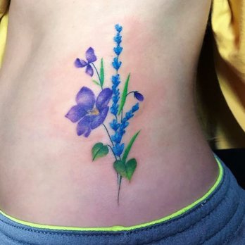 Assassin Tattoo & piercing - Amazing violet tattoo down my side. Done by Olivia - Tattoo Near Me - Houston, Texas