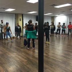 Seven Essential Elements - Open space. Walls and windows covered in white fabric. I attended a fitness bootcamp class here.