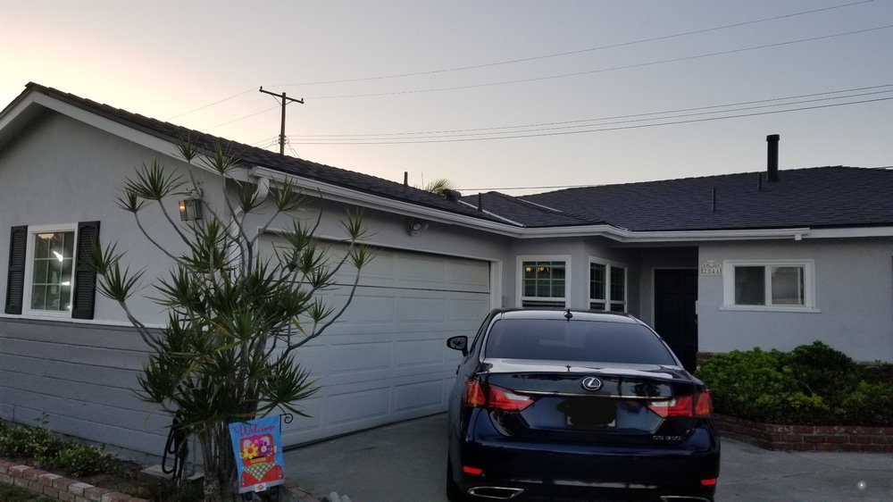 Slide of The Roofing Company