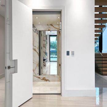 Southeast Elevator - Custom elevator design with mirror and marble walls to match the home's interior. - Elevator Services Near Me - Fort Pierce, Florida Southeast Elevator - Custom elevator design with mirror and marble walls to match the home's interior. - Elevator Services Near Me - Fort Pierce, Florida