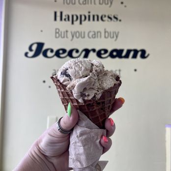 Jack the Dipper Ice Cream - a hand holding an ice cream cone - Ice Cream & Frozen Yogurt Near Me - Waynesville, North Carolina