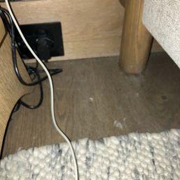 Dust by the bed and plug