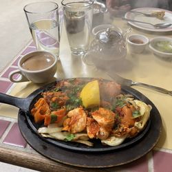 Shanti's Indian Cuisine - Shrimp curry, though, it doesn't look like a curry so I may not be correct. It did come out like a fajita platter does though.