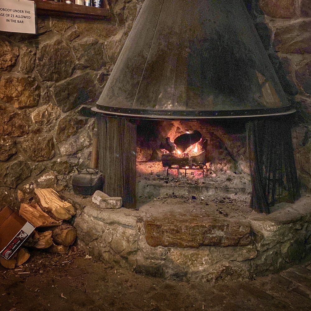 Fireplace in the bar Fireplace in the bar