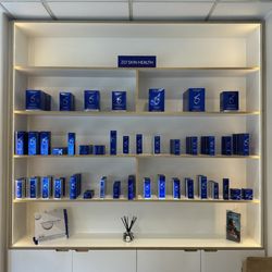 Cannelle Skin Clinic - Illuminated ZO Skin Health retail shelving.