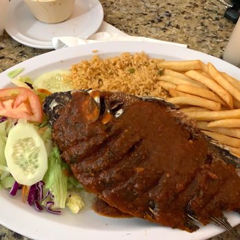 Mariscos Los Arcos - Mojarra a la Diabla with rice, fries, and salad - Mexican Near Me - Canoga Park, California Mariscos Los Arcos - Mojarra a la Diabla with rice, fries, and salad - Mexican Near Me - Canoga Park, California