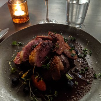 Le Hobbit - Duck breast and pork belly with elderberry sauce. - French Near Me - Quebec City, Quebec