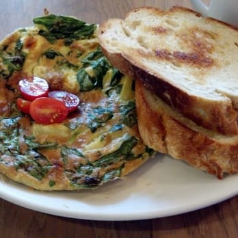 Colossal Cafe - Artichoke Frittata, what's not to like. Plus look at that extraordinary toast, its madness. - American Near Me - Saint Paul, Minnesota Colossal Cafe - Artichoke Frittata, what's not to like. Plus look at that extraordinary toast, its madness. - American Near Me - Saint Paul, Minnesota