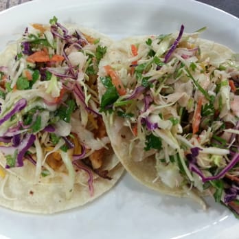 Wahoo's Fish Taco - Citrus slaw taco - cajun wahoo $2.99 left, grilled salmon $3.49 right - Seafood Near Me - Irvine, California Wahoo's Fish Taco - Citrus slaw taco - cajun wahoo $2.99 left, grilled salmon $3.49 right - Seafood Near Me - Irvine, California