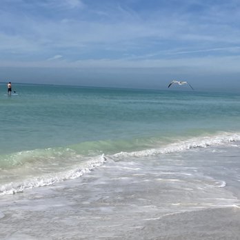 Holmes Beach - My brother is a good paddle boarder. I'm afraid of hammerhead sharks! You wont catch me out there in the gulf - Beaches Near Me - Holmes Beach, Florida
