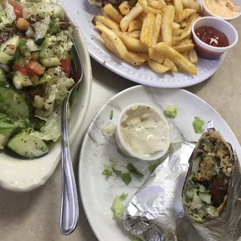 Petra Mediterranean Grill - Chicken shawarma with fries and falafel sandwich with side salad. - Mediterranean Near Me - Roanoke, Virginia Petra Mediterranean Grill - Chicken shawarma with fries and falafel sandwich with side salad. - Mediterranean Near Me - Roanoke, Virginia