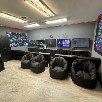 PKgaming - Gaming room with multiple TV's and bean bags and rgb lights - Game Truck Rental Near Me - Burbank, California PKgaming - Gaming room with multiple TV's and bean bags and rgb lights - Game Truck Rental Near Me - Burbank, California